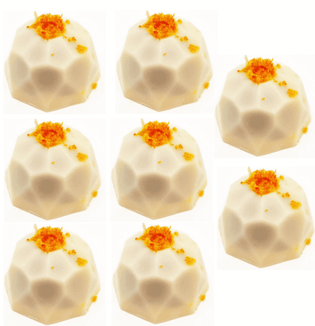 Pralinen aus weißer Schokolade und Sanddorn